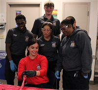 Instructor Leon-Jarjoura instructing Paramedic students.
