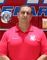 Picture of Capt. Russo in front of Rescue