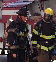 Captain Rifflard Instructing a Firefighter student.